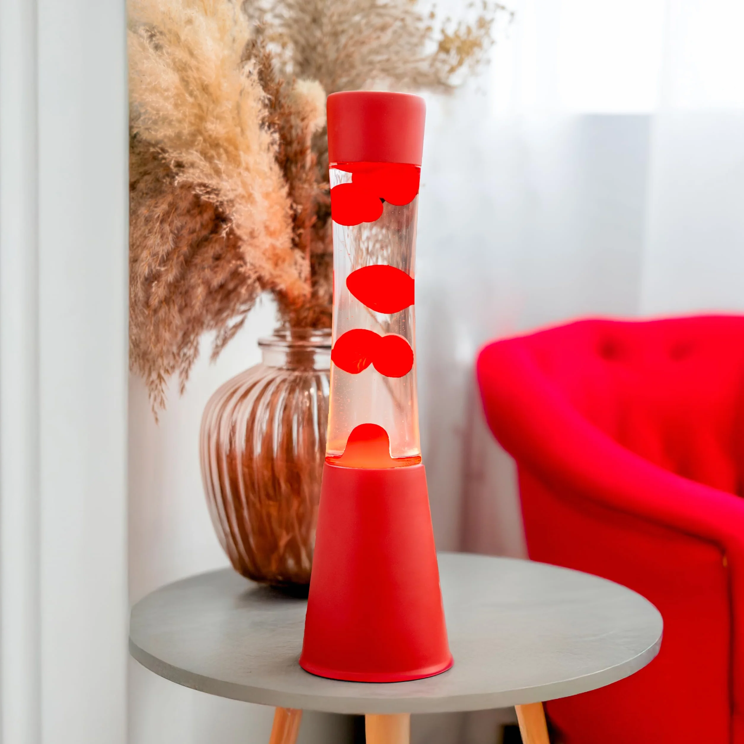 Fisura - Lámpara de lava roja. Base y lava roja con líquido transparente. Lámpara efecto relajante. Con bombilla de repuesto. 11 cm x 11cm x 39,5 cm.